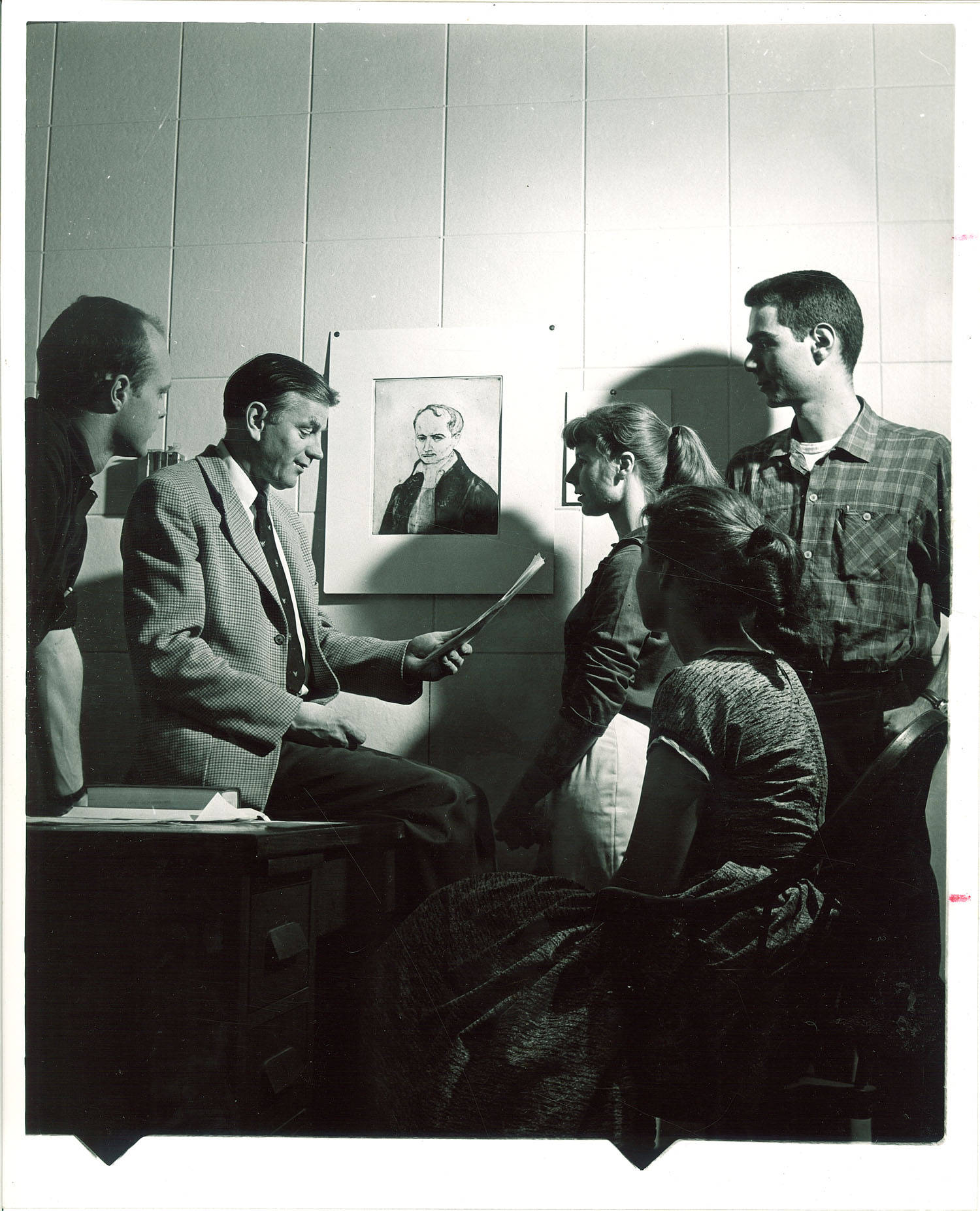 MFA Iowa Writers Workshop director Paul Engle with students The University of Iowa 1950s. Frederick W. Kent Collection / University of Iowa Archives
