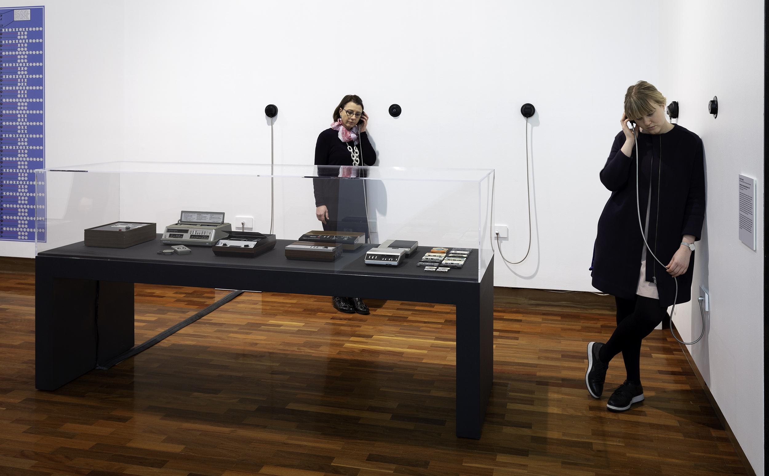   Susan Schuppli, Listening to Answering Machines, 2018, answering machines, headphones, sound. Image courtesy of the artist.