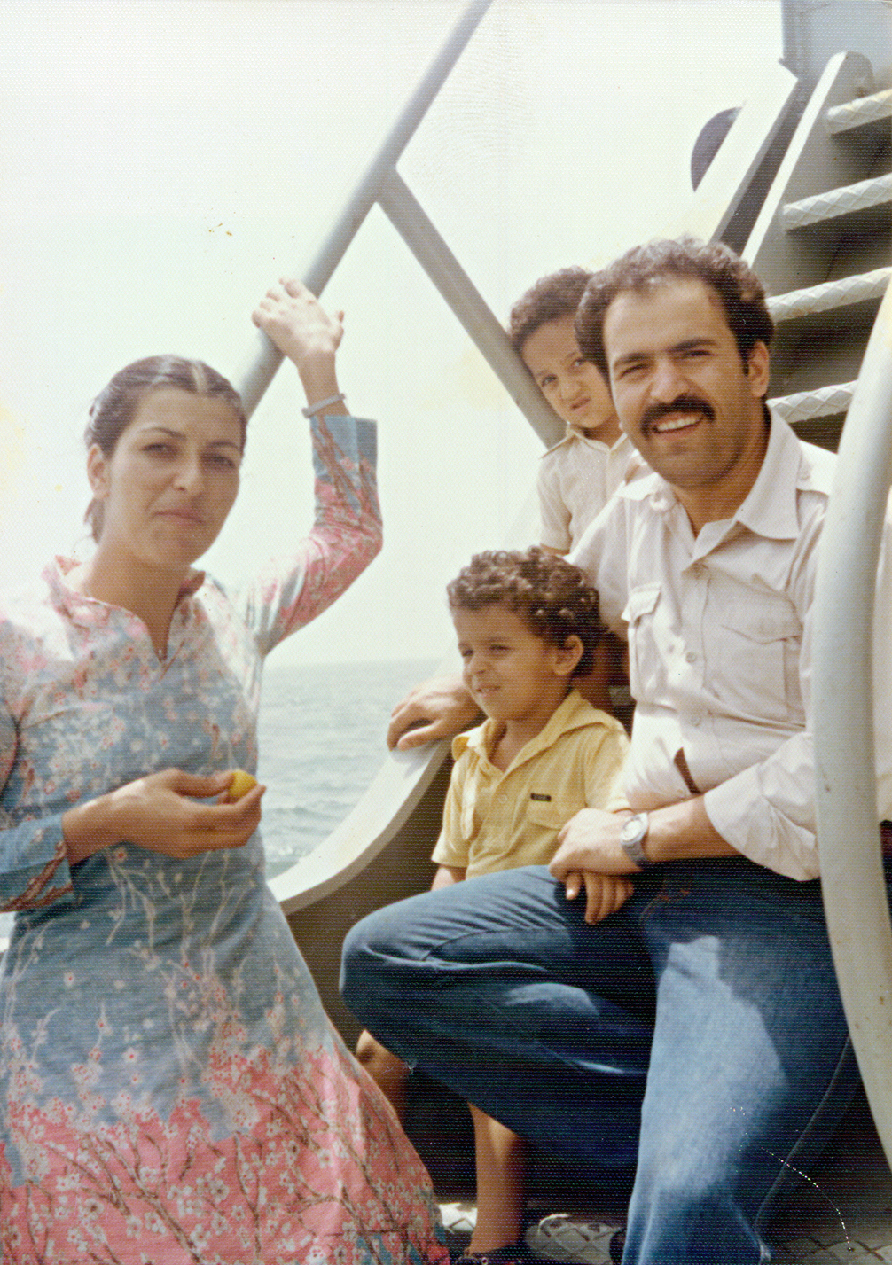The Razavi family aboard a naval vessel in Karachi Harbour, Pakistan, 1979 (supplied)
