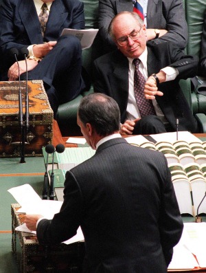 Time's up. Opposition leader John Howard looks at his watch during Question Time on 23 October 1995 (photograph by Andrew Taylor, Fairfax)