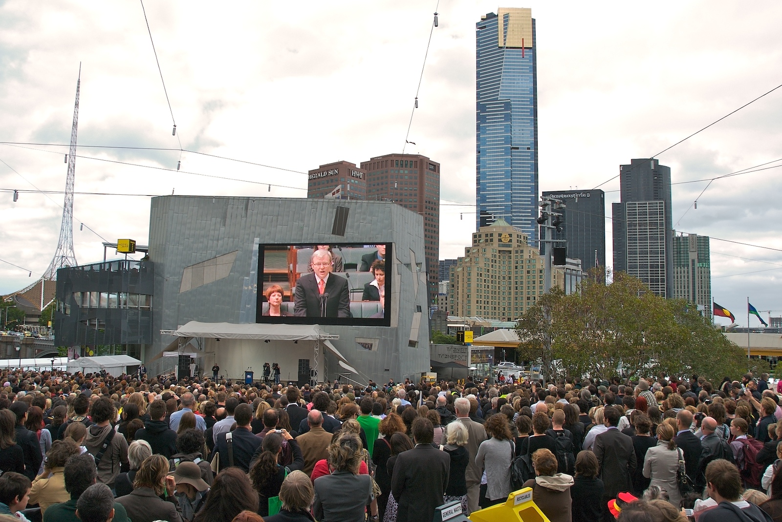 Prime Minister Kevin Rudd onscreen in Federation Square, Melbourne, apologising to the Stolen Generations