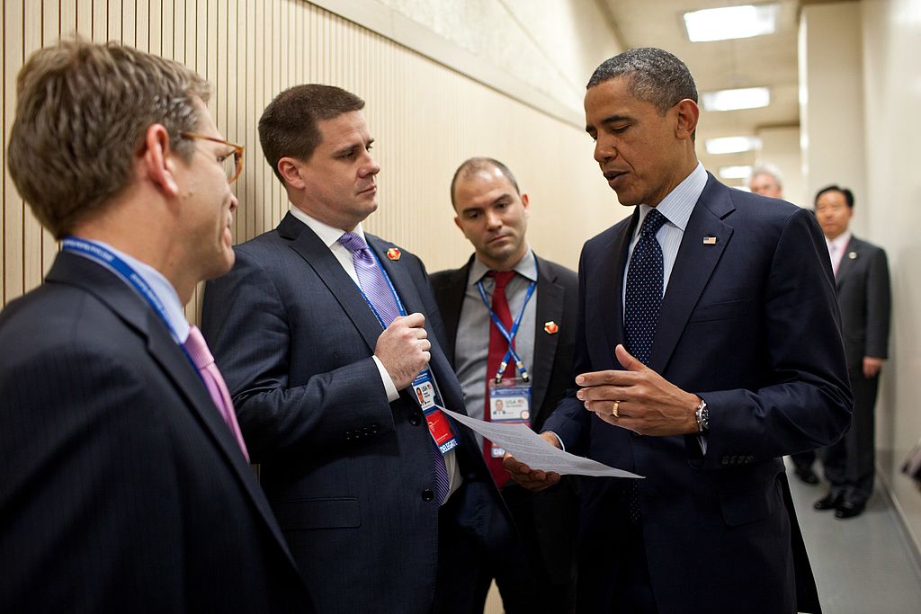 President Barack Obama talks with (from left) Press Secretary Jay Carney and Director of Communications Dan Pfeiffer (photograph by by Pete Souza/Wikimedia Commons)
