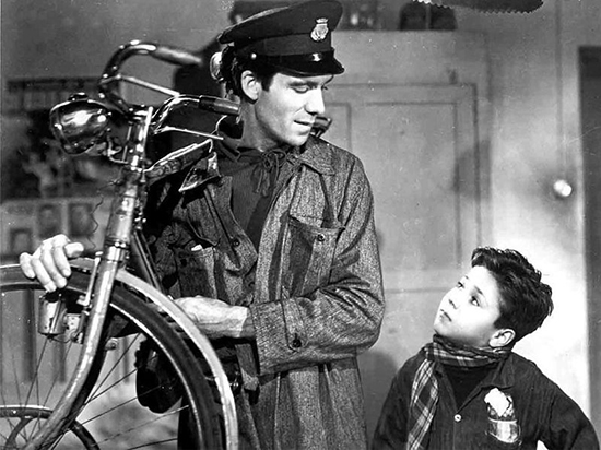 Lamberto Maggiorani and Enzo Staiola in Ladri di biciclette 1948