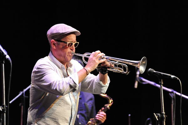 DAVE DOUGLAS - white shirt and cap playing trumpet smaller for online