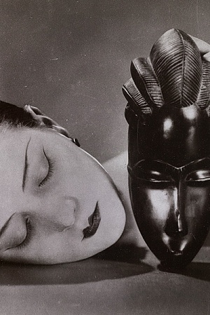  Man Ray Kiki with African mask 1926 National Gallery of Victoria © MAN RAY TRUST / ADAGP, Paris (licensed by Copyright Agency and photograph by Helen Oliver-Skuse / NGV). 