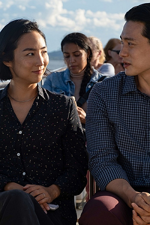 Greta Lee as Nora and Teo Yoo as Hae Sung. 