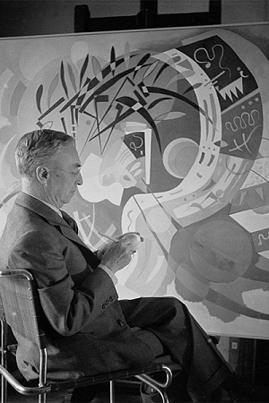 Kandinsky with his painting 'Dominant curve (Courbe dominante)', Paris 1936, photo Boris Lipnitzki © Boris Lipnitzki  Roger-Viollet